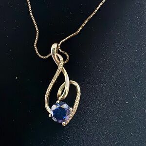 Sapphire and diamond pendant necklace